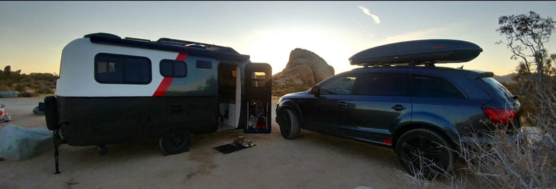 RV rental adventure: Compact travel trailer and SUV parked in a desert landscape at sunset, ideal for outdoor exploration. — photo 19