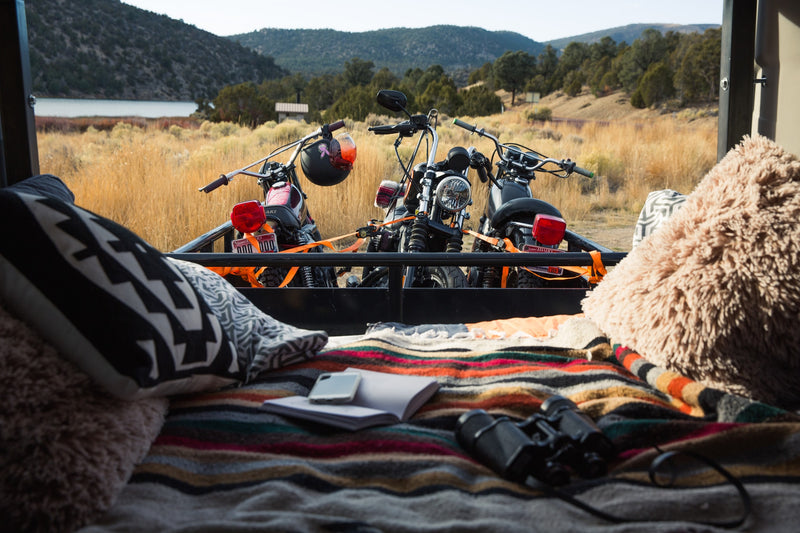  with a unique corn-shaped pillow.|RV rental view: Three motorcycles loaded in back — photo 16