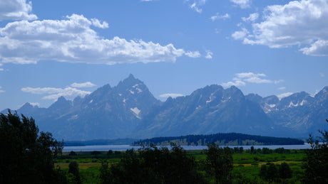 Stunning Grand Teton landscape with lake & mountains. An RV rental is perfect for exploring this scenic beauty.