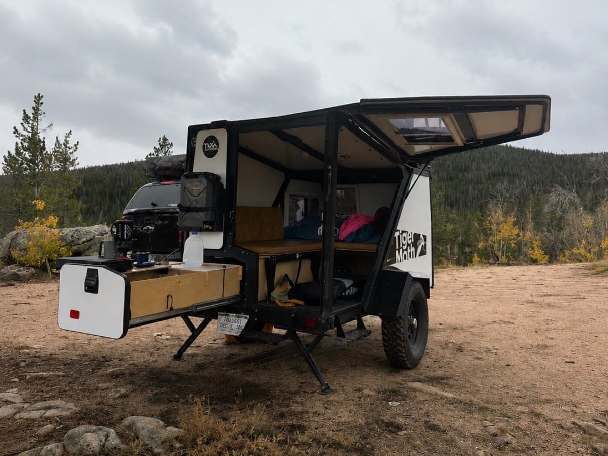  and a clear sky for your outdoor adventure.|RV rental kitchen setup with a Primus stove — photo 5