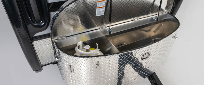 and living spaces.|Compact RV rental kitchen featuring a sink — photo 11