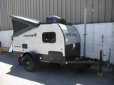 Explore this compact Viking pop-up travel trailer, ideal for an **RV rental** adventure with its rugged design and off-road tires.