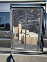 RV rental: Side door open with a Bugwalli black mesh screen, revealing light-colored interior benches. Great for pest-free camper airflow.