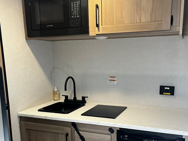  perfect for travel.|RV rental interior: empty storage closet with a built-in bench — photo 14