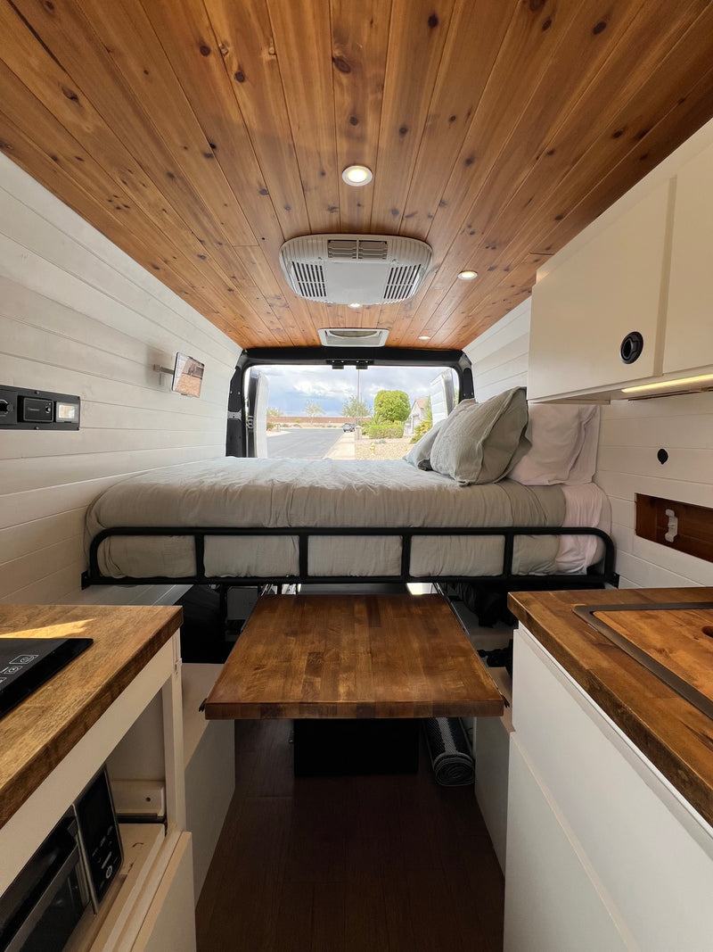  and a sunny palm tree view.|Dark grey camper van — photo 9