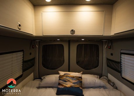  and a stunning desert view outside. Ready for adventure!|View inside an RV rental's campervan kitchen