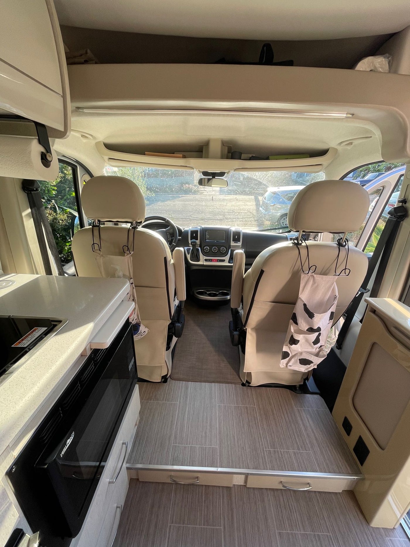  ideal for travel cooking.|Inside an RV rental: a modern dashboard featuring a Pioneer multimedia display — photo 2