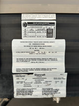Starcraft RV rental trailer safety label: VIN, tire pressure, and weight specifications. Crucial info for safe operation.