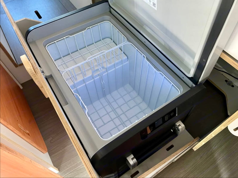  set for two. Perfect for a mobile getaway.|Stunning rv rental interior with expansive ocean views. Features dining — photo 7