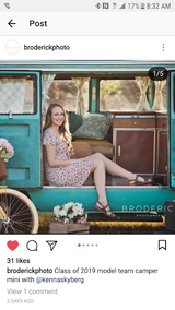Smiling model in a chic teal camper van. Ideal for unique photo shoots or your next rv rental adventure!