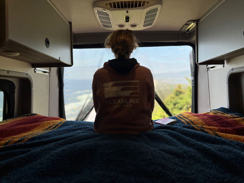  with a scenic outdoor view visible through the rear window.|Inside a comfy RV rental — photo 8