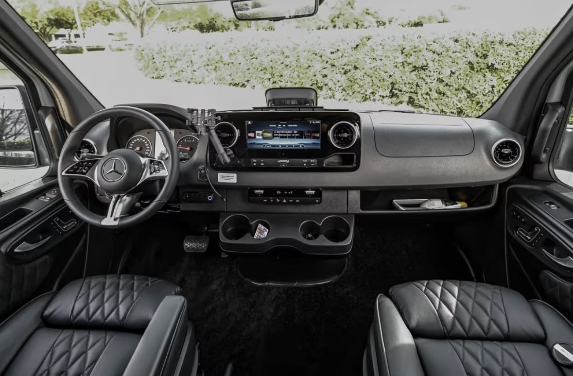  perfect for your next RV rental adventure.|Inside this premium rv rental: a modern Mercedes-Benz cockpit with large display — photo 2