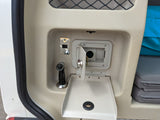 External **RV rental** utility panel: outdoor shower, water inlet, control switch, and drain tray.