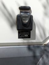 RV power inlet: Furrion 30 Amp, 125V connection on an rv rental. Shows electrical specifications.