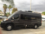 Dark grey Sequence Ram ProMaster camper van, a perfect RV rental for your next road trip adventure.