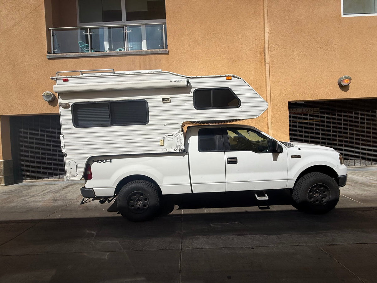  with a Davlin truck camper (RV rental style) — photo 2