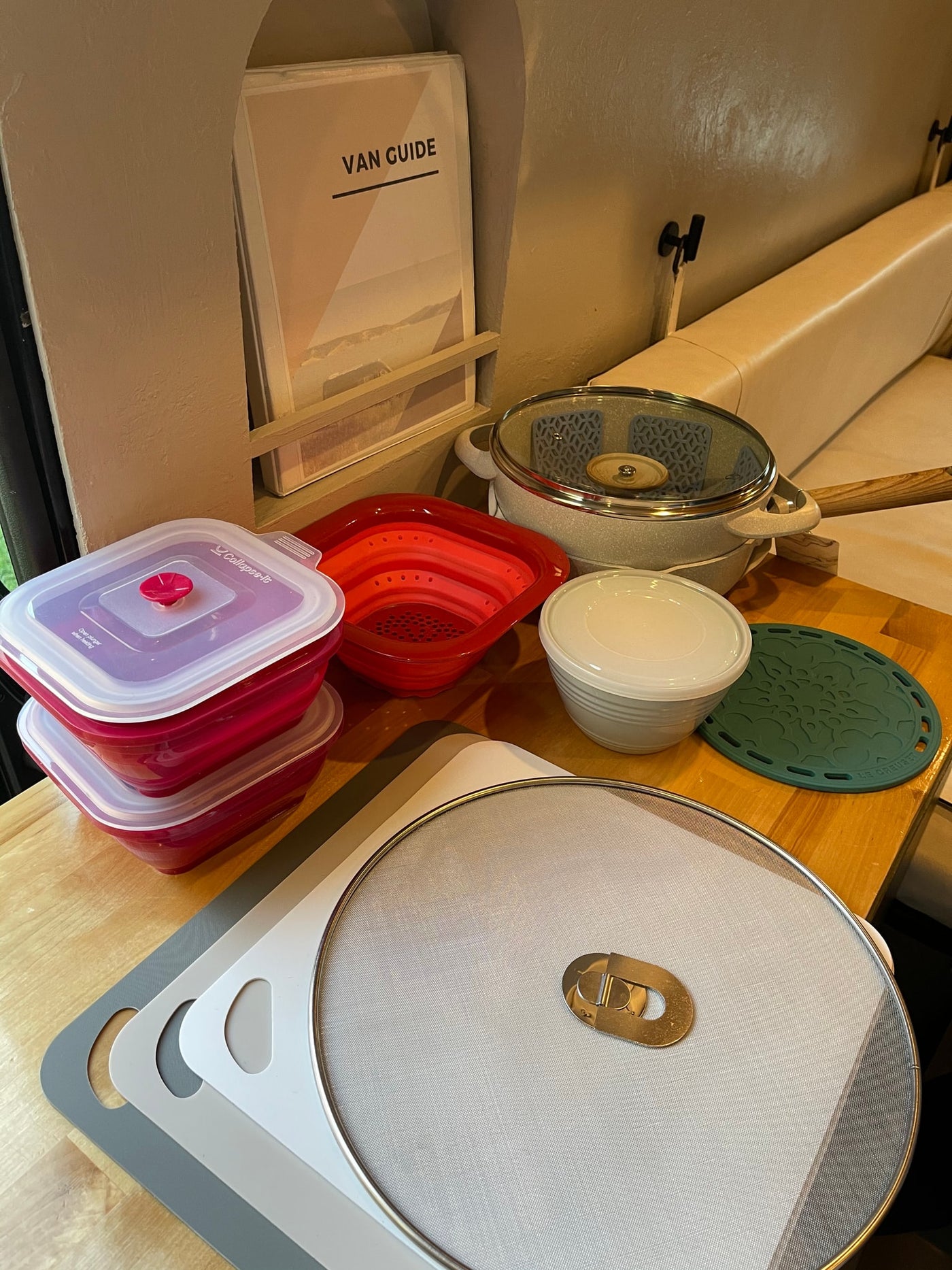 RV rental cooking gear: Space-saving kitchenware like collapsible containers, pots, cutting boards, & splatter screen. — photo 14
