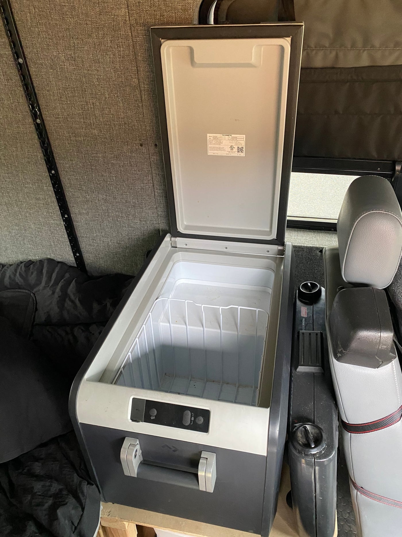 An open Dometic portable fridge/freezer in an RV rental, ready for your road trip snacks. — photo 37