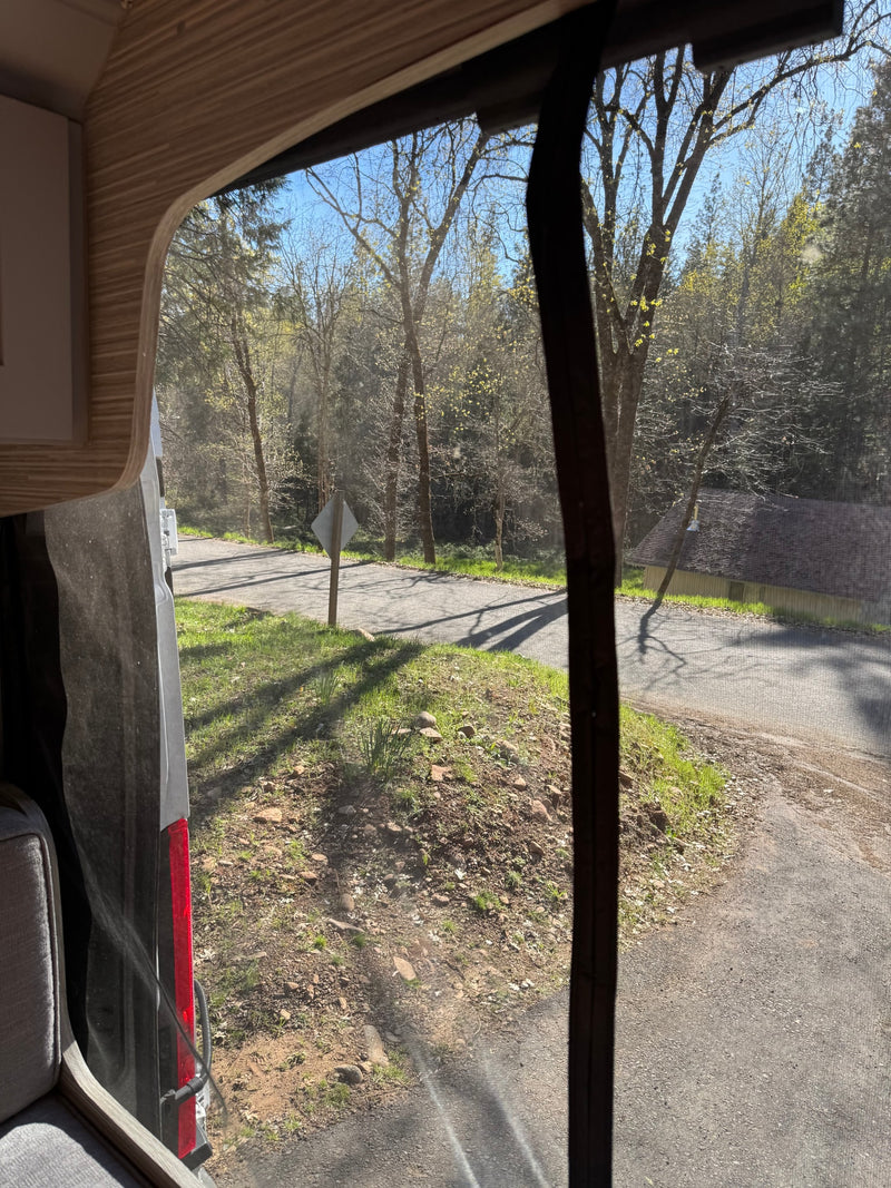  and plush sofa.|Inside an RV rental: a modern kitchenette with a Galanz microwave — photo 17