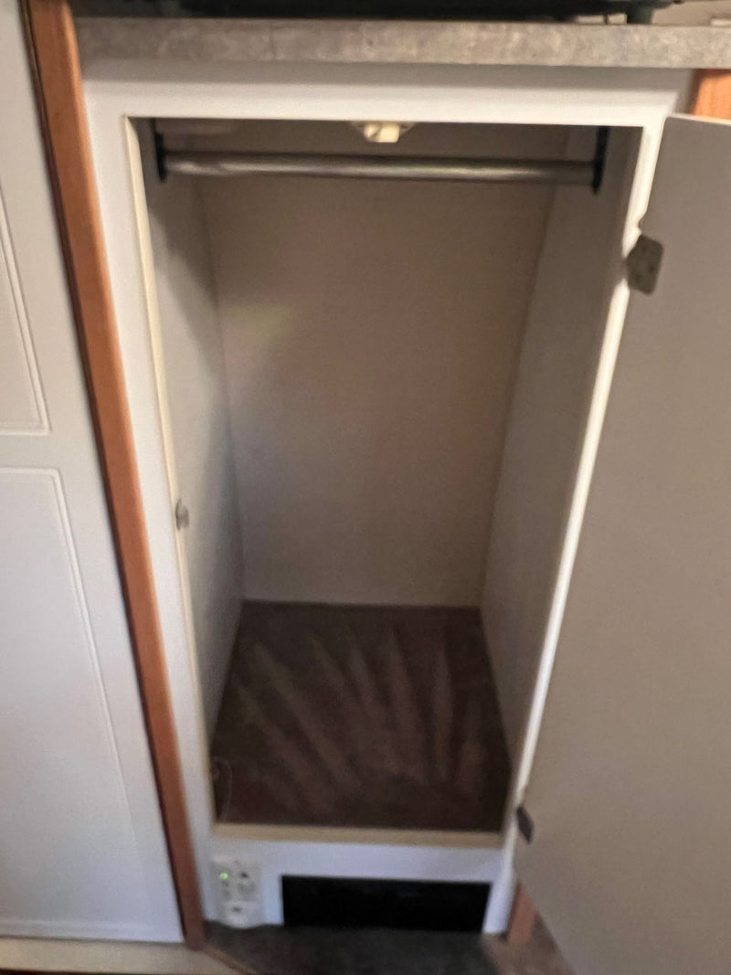 showing its interior with brown seating — photo 13
