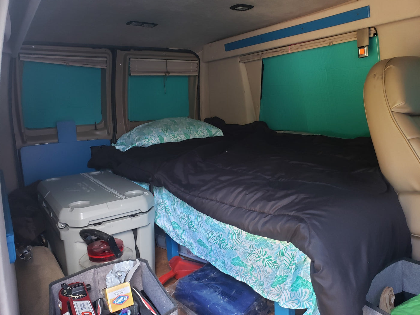  with an Alaska license plate.|Dark blue conversion van — photo 7