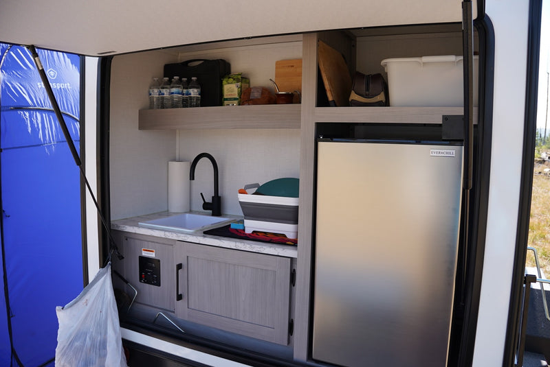  and OSB paneling.|White built-in AC unit inside an RV rental — photo 13