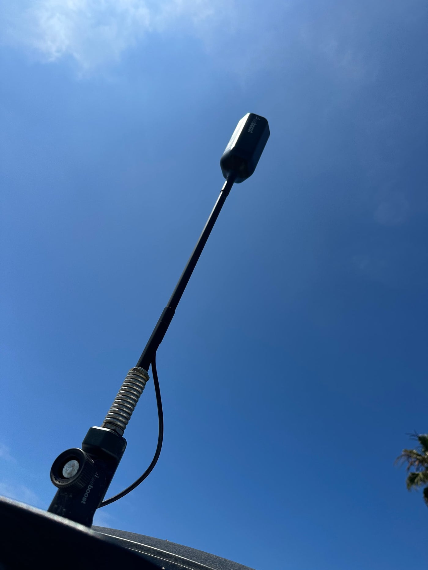 Up close: a weBoost cell signal antenna mounted on an RV rental, providing improved reception on the go. — photo 19