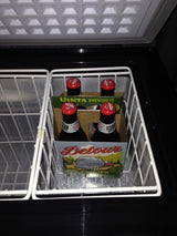 Chilled Uinta Detour beer, featuring an RV on its label, inside a cooler. Ideal for your RV rental journey.