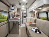 RV rental's modern mobile living space: compact kitchen, cozy lounge, and scenic views for travel.