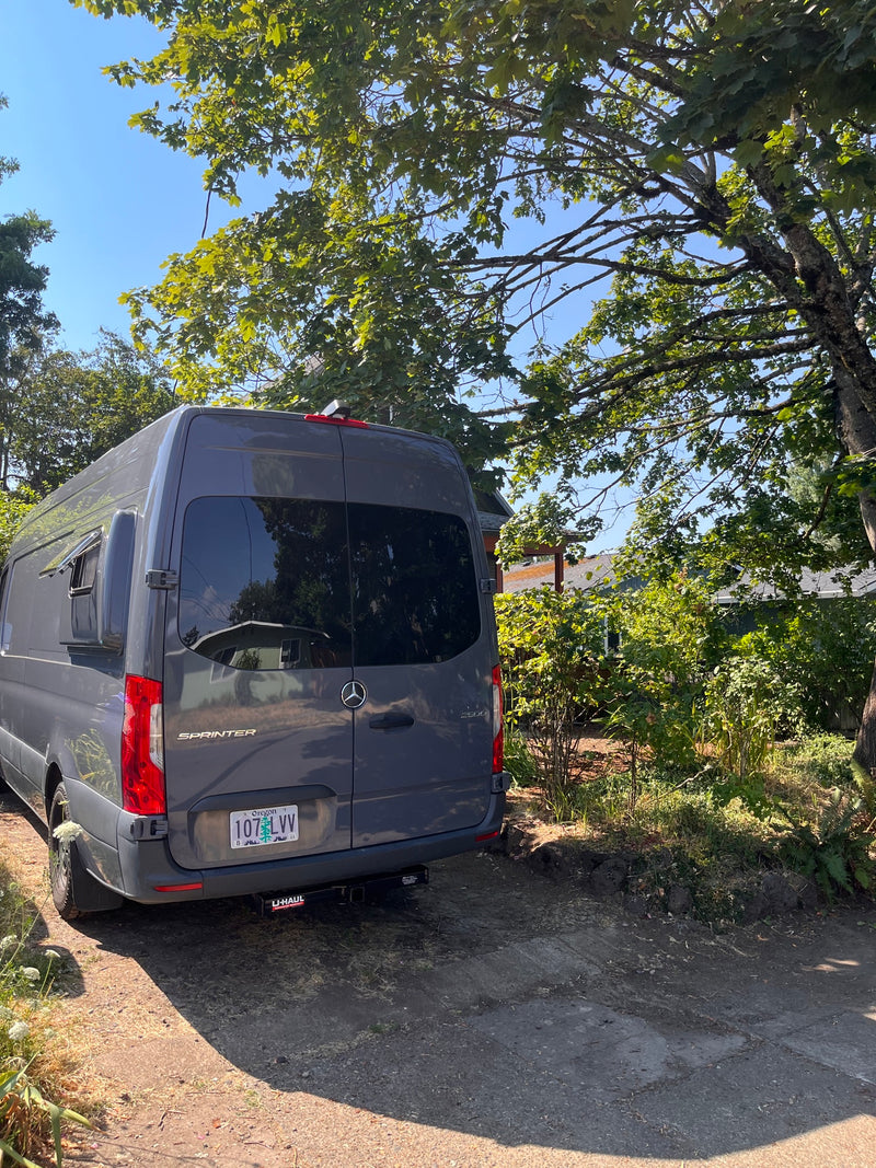 Gray Mercedes-Benz Sprinter van, an RV rental, parked on a sunny path with an Oregon plate. — photo 10