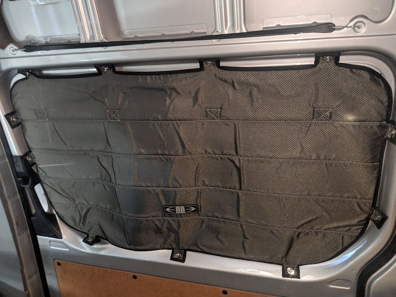 Quilted insulation panel for an RV rental van window, providing privacy and temperature control. — photo 11