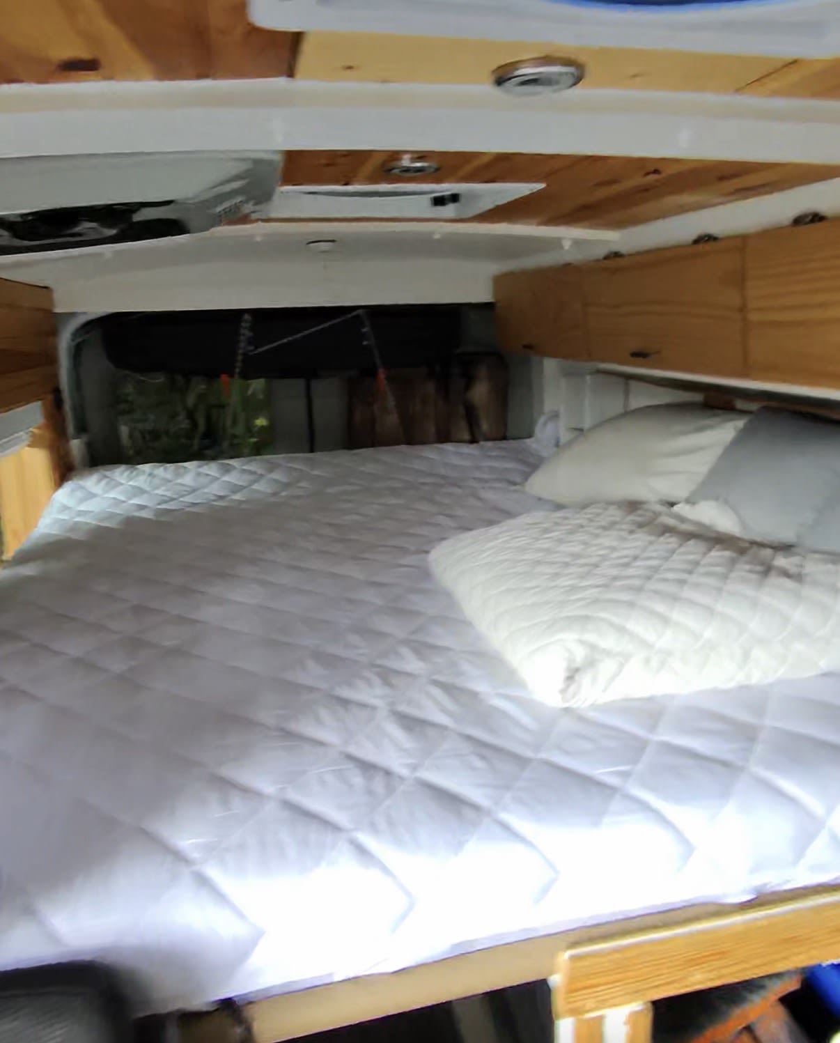  parked outdoors.|White Ford Transit-style campervan — photo 6