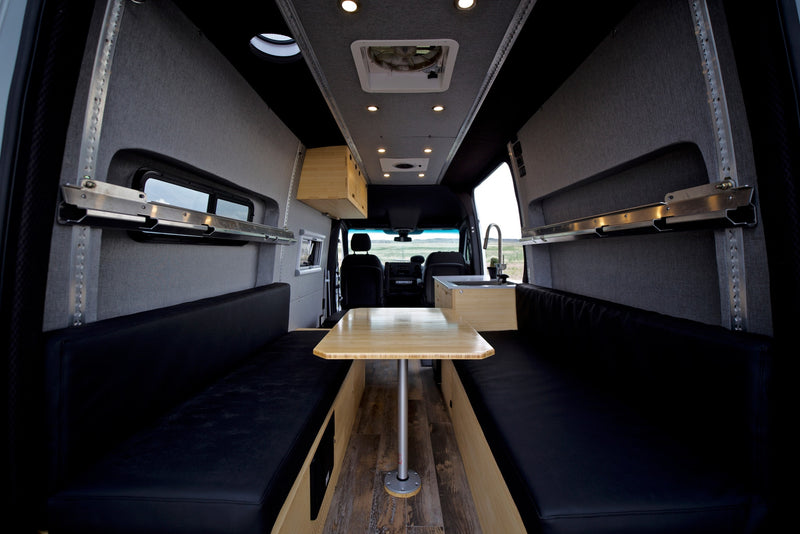  and overhead storage for your next adventure.|Interior of a modern RV rental — photo 9
