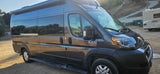 Gray Ram ProMaster Tellaro RV rental van shown on a sunny day. Ideal for your next camper van adventure!