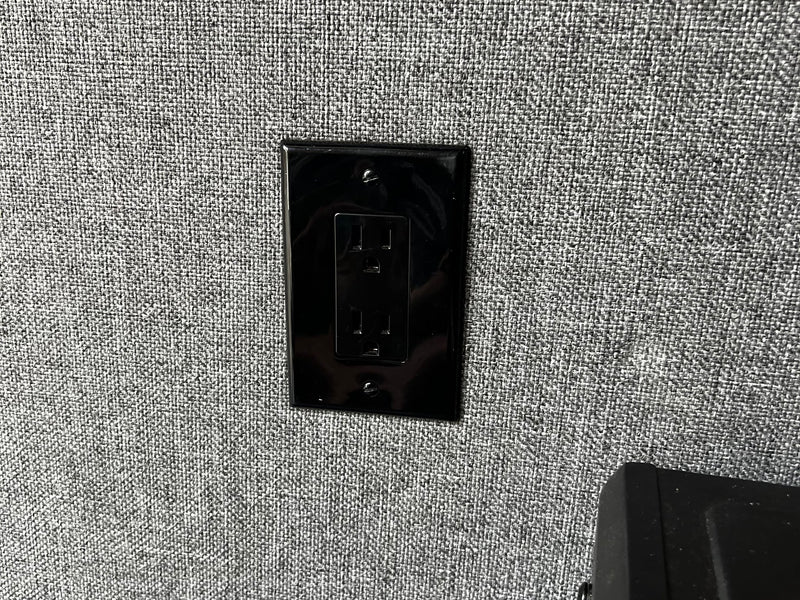 and wooden overhead cabinets.|RV rental interior: Rear seats with a large window view and power outlets with a phone charging setup.|RV rental interior: white van wall with a black air vent — photo 20