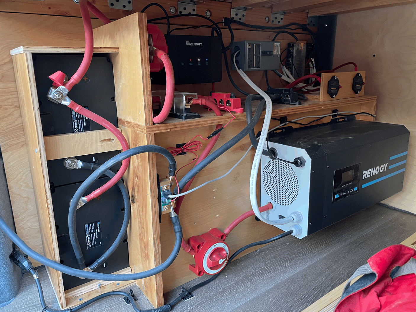An RV rental's Renogy electrical system, featuring batteries, inverter, charge controller, and power distribution.
