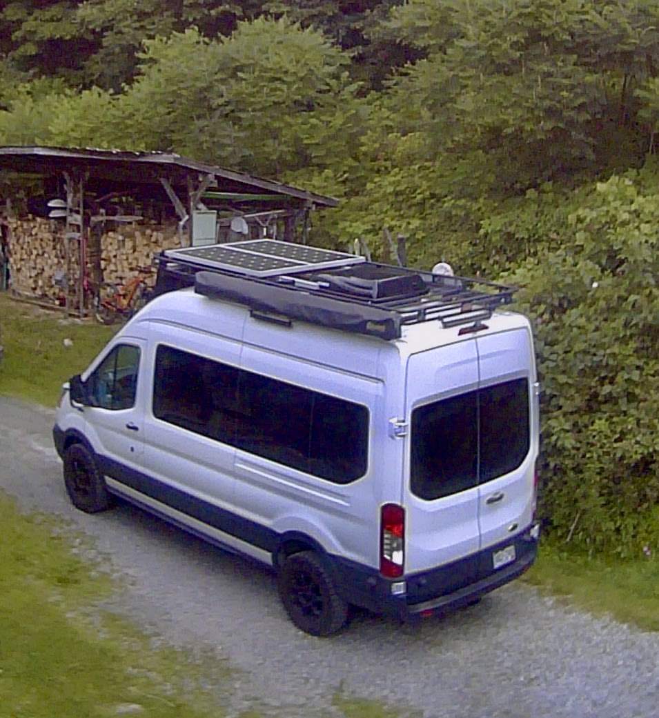  and versatile anchor-point floor.|Modern RV rental van interior showcasing an elevated bed