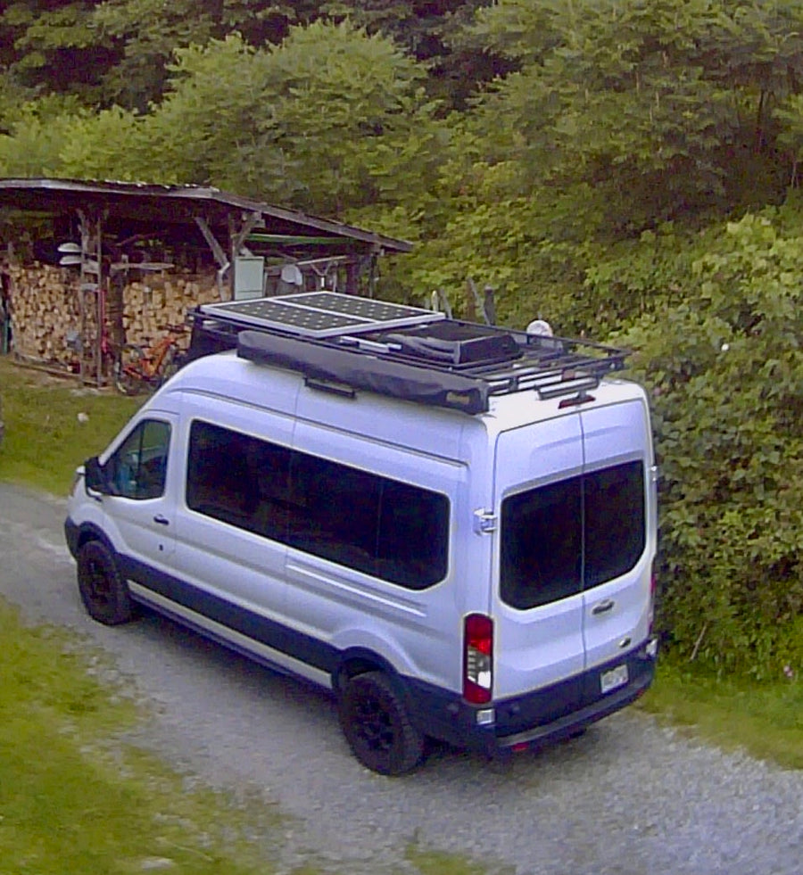  and versatile anchor-point floor.|Modern RV rental van interior showcasing an elevated bed