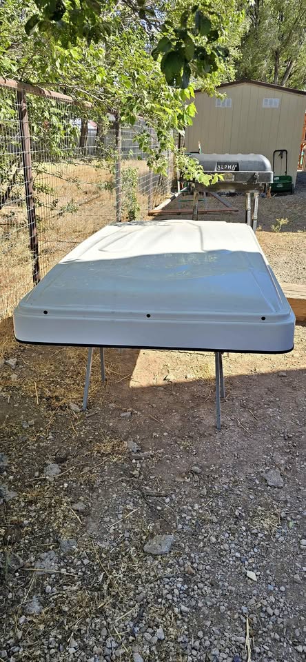 White "ikamper style" roof top tent