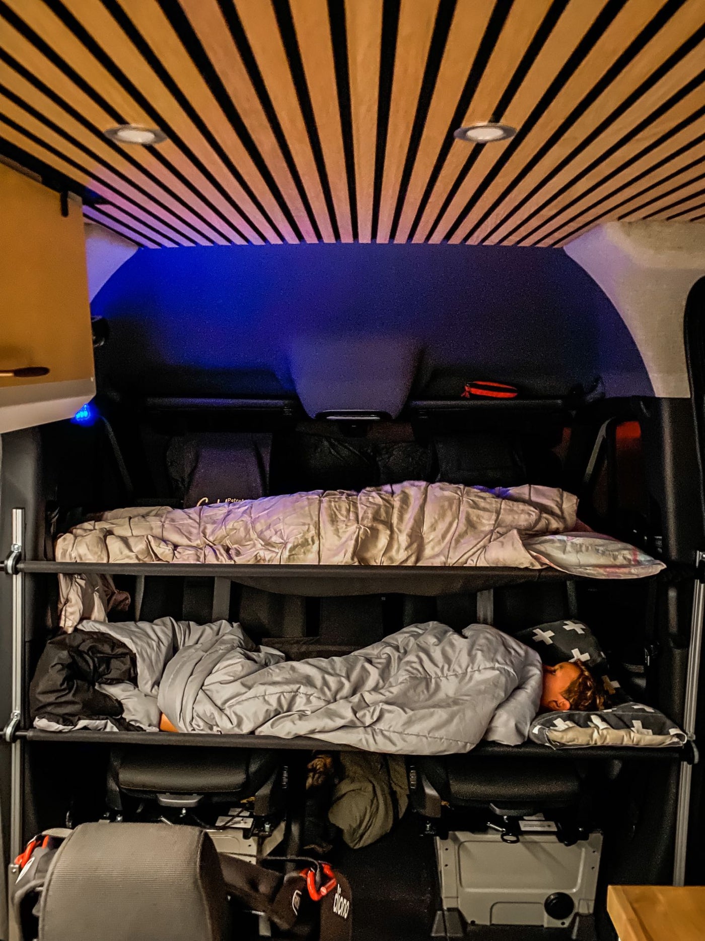 available for RV rental.|Spacious RV rental interior with comfy multiple-row seating — photo 4