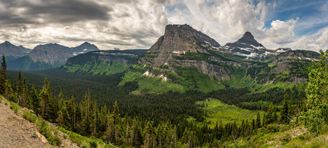 Panoramic views of majestic mountains, verdant forests, and snowy peaks await your RV rental journey through stunning natural beauty.