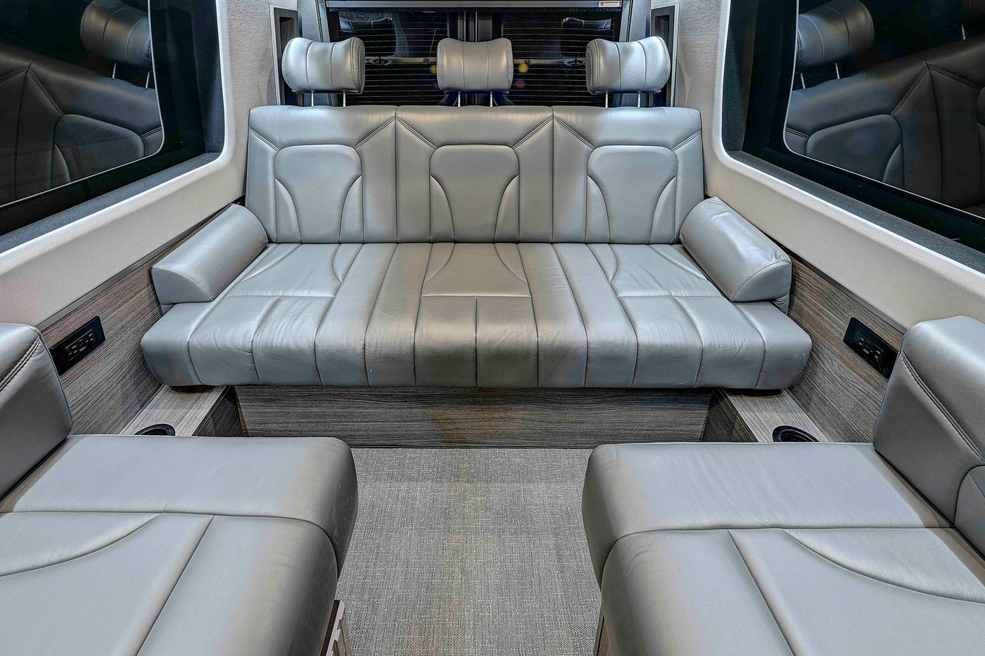  perfect for your next adventure.|Modern RV rental interior: a sleek kitchen with a sink — photo 12