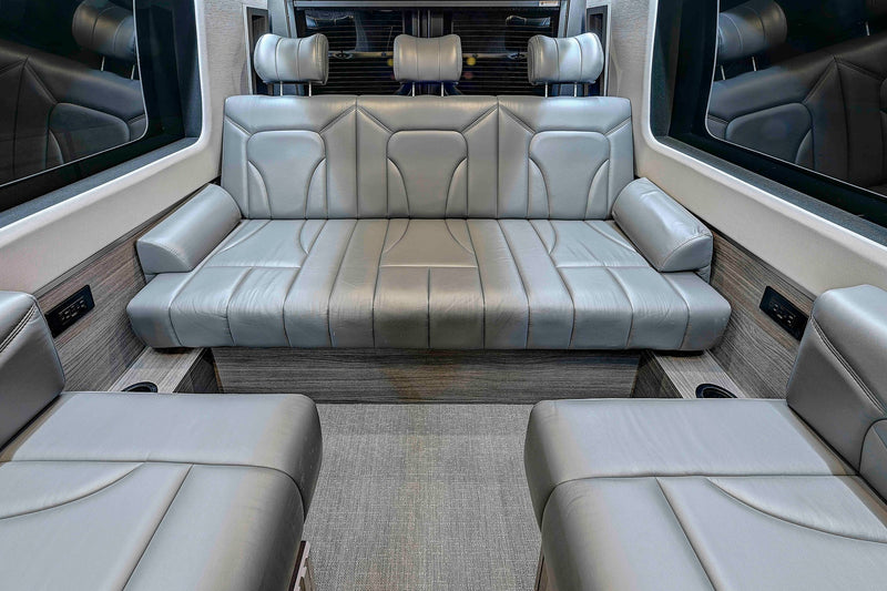  perfect for your next adventure.|Modern RV rental interior: a sleek kitchen with a sink — photo 12