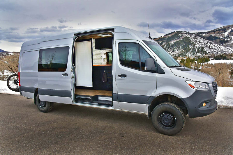  ready for adventure.|Silver Mercedes Sprinter rv rental camper van with its side door open — photo 2