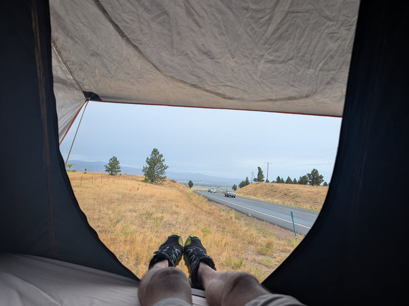  ideal for an overland RV rental or off-grid camping adventure.|Enjoying the road trip view from an RV rental. Feet up — photo 3