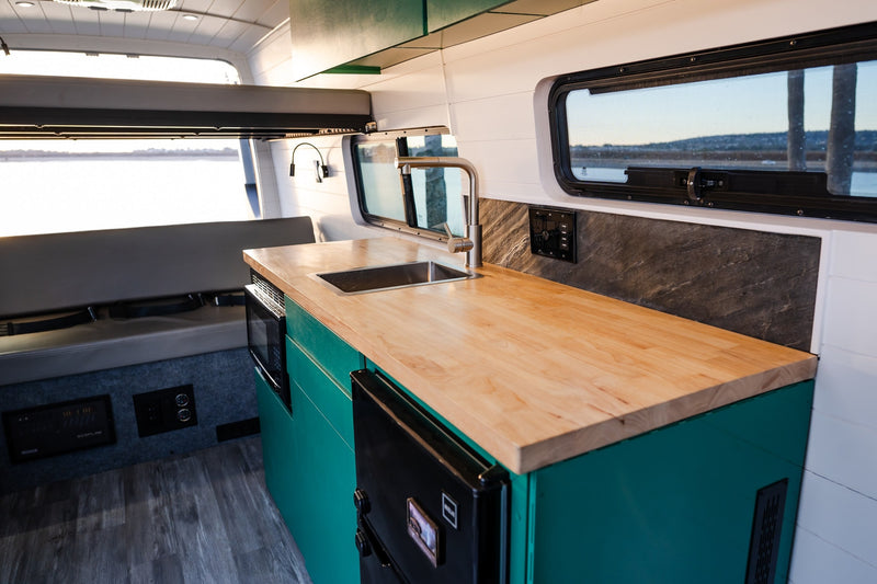  and hand controls for an accessible road trip.|Modern RV rental driver's cabin: Steering wheel — photo 18