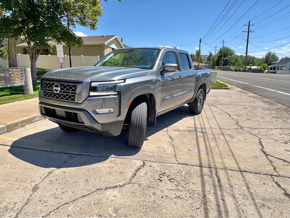 2024 Nissan Frontier Crew Cab · SL Pickup 4D 5 ft — photo 1