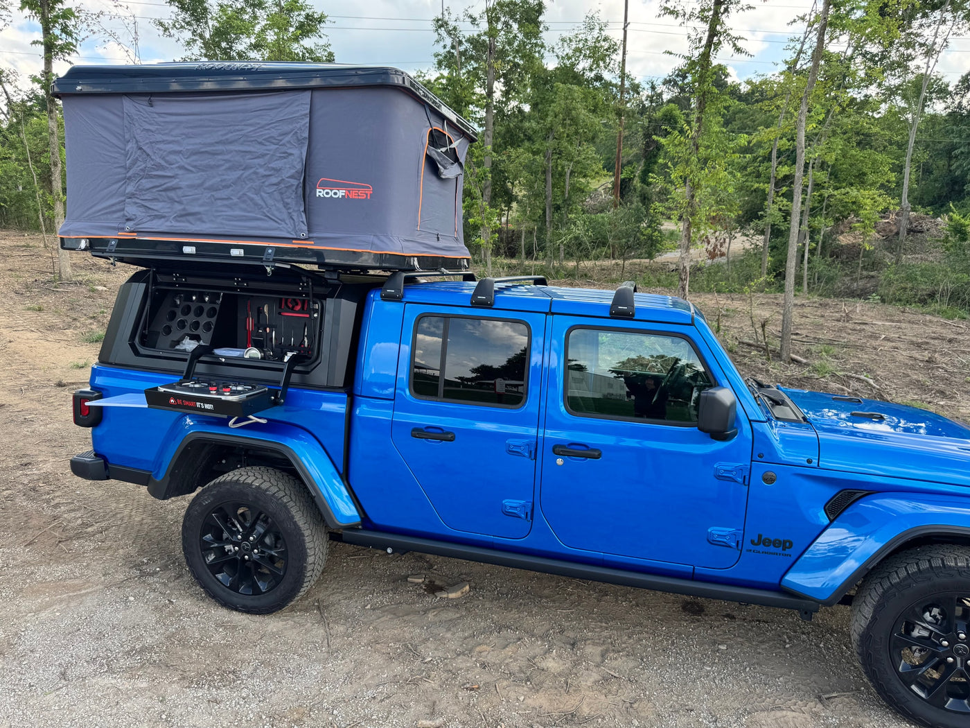  showing comfortable seats and open door.|Blue Jeep Gladiator rv rental — photo 14