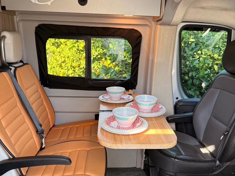 and outdoor grill ready.|This RV rental floor plan displays a compact camper van layout with bed — photo 15
