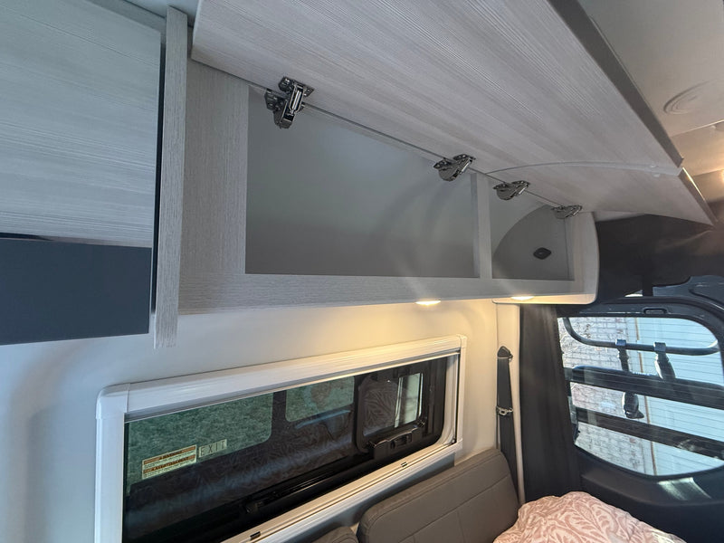  and a fun deer pillow.|Modern Mercedes-Benz dashboard and infotainment display inside an RV rental — photo 5